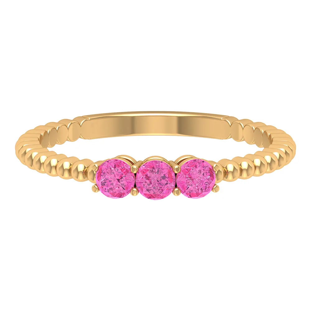 1/2 CT Pink Sapphire and Gold Beaded Three Stone Promise Ring