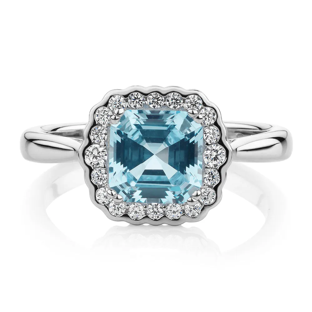 Dress ring with blue topaz simulant in sterling silver