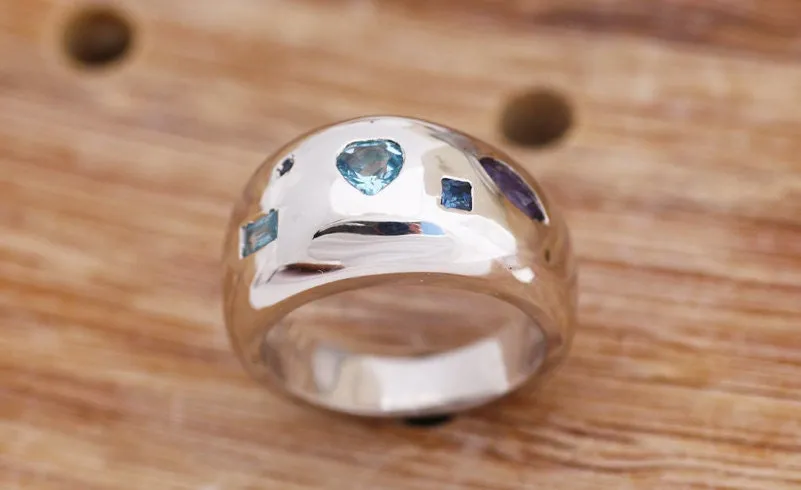 Silver ring with Iolites, Aquamarines and Sapphires
