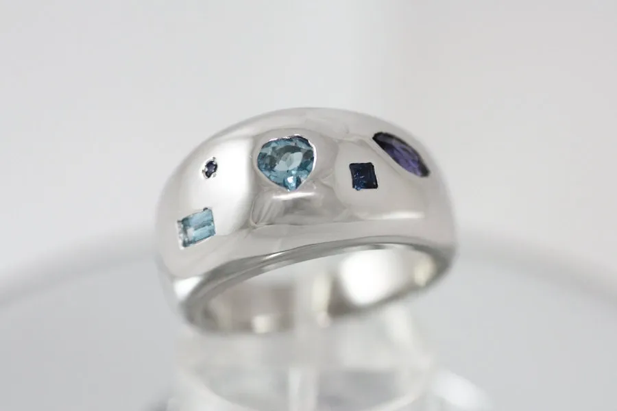 Silver ring with Iolites, Aquamarines and Sapphires