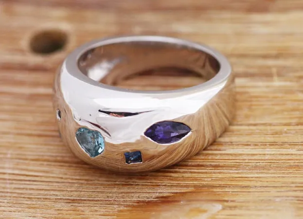 Silver ring with Iolites, Aquamarines and Sapphires